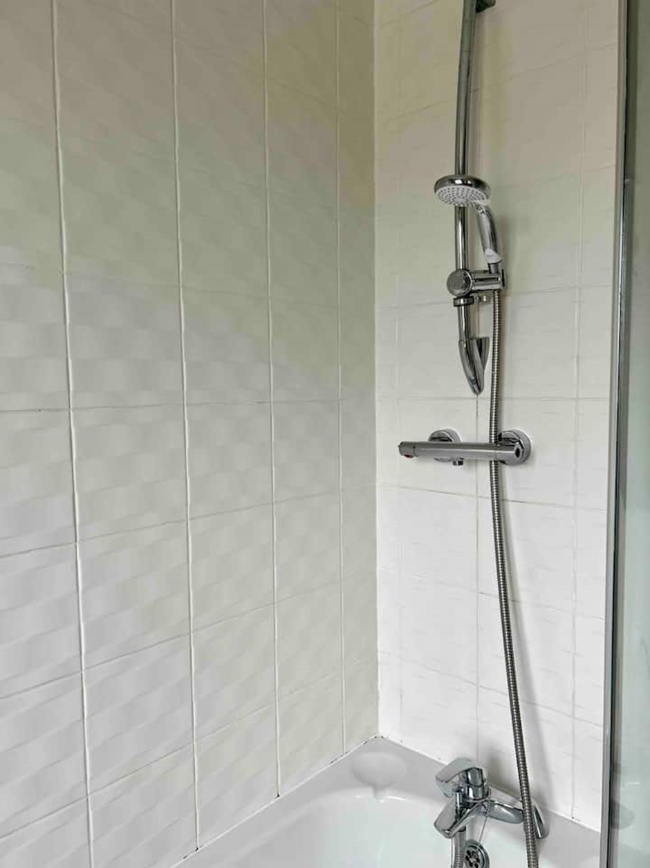 Bathroom with shower and bath